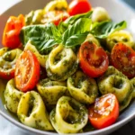 Delicious Pesto Tortellini Salad with Fresh Cherry Tomatoes First Image First Image